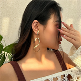 Female Trendy Round Circle Twisted Earrings