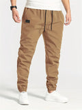 Men's Drawstring Patch Ankle-tied Tapered Trousers